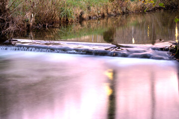 a small waterfall in a stream