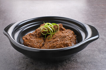 Rendang Daging Sapi, traditional food from Padang, Indonesia. Beef stew with spices, herbs and coconut milk
