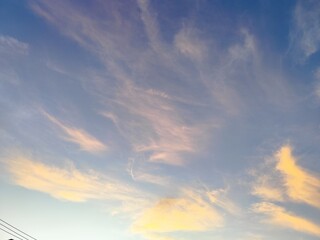 clouds in the blue sky at sunset time, beautiful nature background
