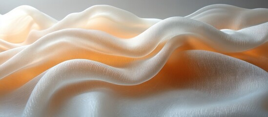 Obraz premium Soft, flowing ivory and peach fabric draped in elegant waves.