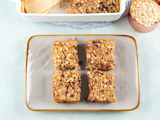 Baked oatmeal peanut butter banana cake bars with chocolate chips