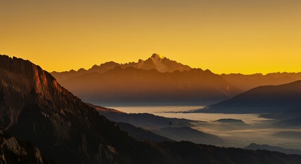 A serene sunrise over a mountain range , with a misty valley below, in warm golden tones .