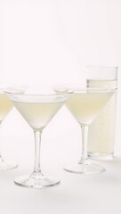 Fototapeta premium Photorealistic portrait featuring cocktails against a white background with an aspect ratio of 169