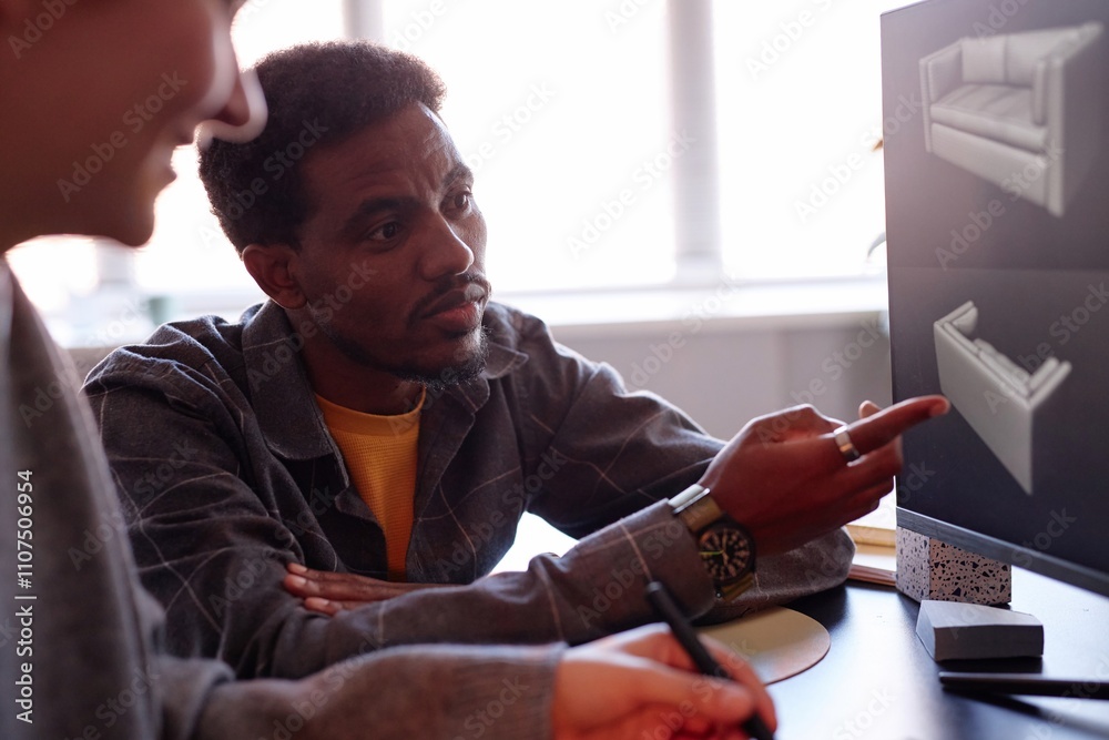 Fototapete african american man engaging in collaborative design process with colleague, using computer equipme
