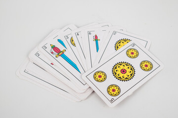 deck of spanish cards on white background
