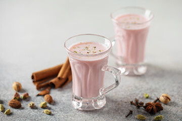 Pink Tea Kashmiri Chai. Traditional Kashmiri tea with  sliced pistachios, almonds. Pakistani cuisine