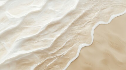 Obraz premium Gentle Waves Lapping on a Serene Beach with Soft Textures of Sand and Foam, Evoking a Peaceful Atmosphere for Relaxation and Reflection, Nature Beauty Unveiled