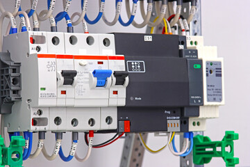 Automatic current switches to protect electrical loads. Soft focus.