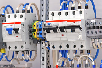 Automatic current switches to protect electrical loads. Soft focus.