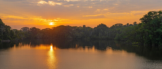 Sunrise panorama in Amazon River Rainforest comprising countries of Brazil, Bolivia, Colombia, Ecuador, French Guyana, Peru, Suriname and Venezuela.