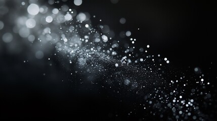 黒い背景とキラキラした粒子が水流や波の様に舞うCG画像