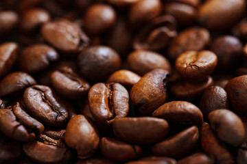 background. roasted beans of natural coffee. raw materials for coffee shops, coffee machines.