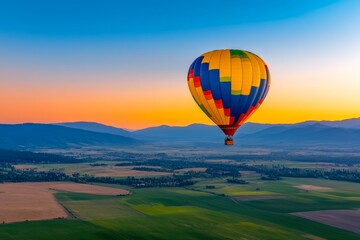 Obraz premium A colorful hot air balloon rising into the sky during sunrise over a picturesque landscape. Generative AI