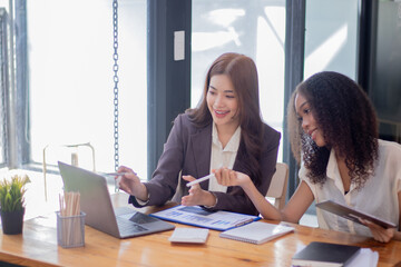 Professional business woman having online team meeting She sits in a sleek, modern workstation....