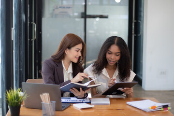 Professional business woman having online team meeting She sits in a sleek, modern workstation....