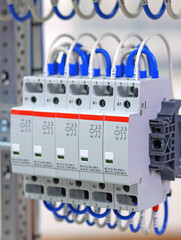 An electromagnetic contactor for controlling electrical loads. Close-up. Soft focus.