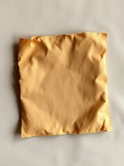 Obraz premium Vintage aged paper envelope with faded writing, isolated, closed envelope, nostalgia, aged paper