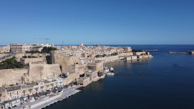 Valletta waterfront, Malta, aerial view. Valetta on the left and three cities on the right. High quality 4k footage