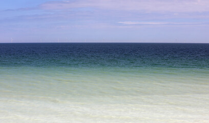 shades of blue and light azure of the sea without people ideal as a background for unspoiled nature