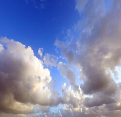clouds in the blue sky ideal as a background for the concept of paradise or weather forecasts