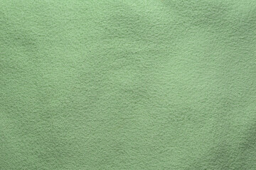 Un trozo de tela verde oliva para usar como fondo. 