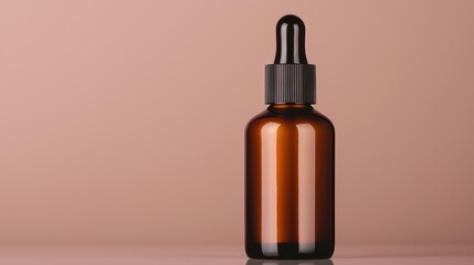 Fototapeta premium Elegant amber dropper bottle standing on reflective surface with soft ambient lighting