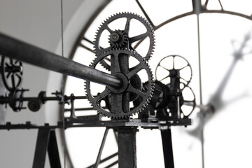 black and white photo of the inside parte of a clock tower