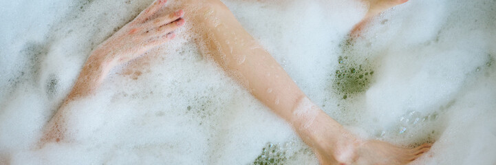Fototapeta premium Website banner with unrecognizable woman lying in bath with foam
