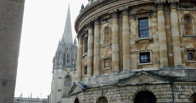 Exterior Shot Of Radcliffe Camera And University Church Of Saint Mary The Virgin In Oxford UK