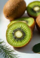 A beautifully arranged display of fresh kiwi fruits showcases their vibrant green flesh, with one sliced in half revealing its intricate pattern of seeds and bright interior. The warm, fuzzy exterior