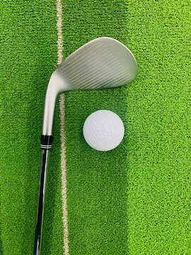 golf club and ball