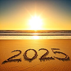 2025 written in the sand on a beach with a sunset in the background.

