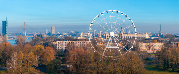 Morning Aerial View of Riga with Ferris Wheel and Vansu Bridge