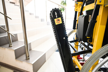 adaptation to a wheelchair for climbing stairs