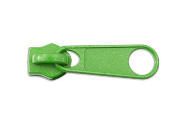 Green metal zipper slide isolated on white. Cutout object with painted color slider. Fashion and clothing hardware element for garments. Durable accessory for textiles and sewing projects. © Paweł Michałowski