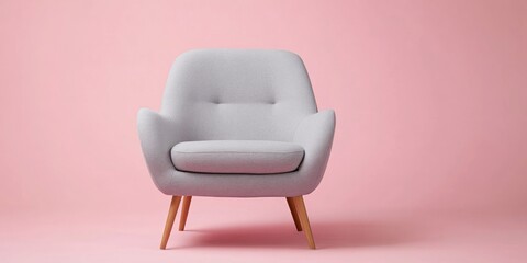 Fototapeta premium Modern light grey armchair on pink background.