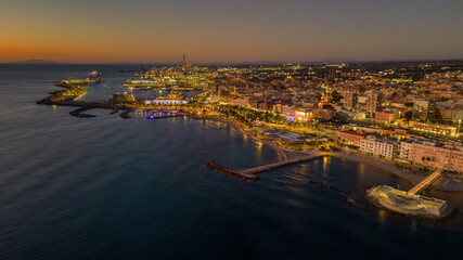 Fototapeta premium Small Italian town seen from above, sea and cars. Civitavecchia