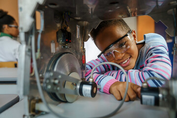 Young Girl Engages in Robotics Education