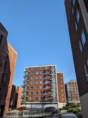 Fototapeta premium Top Floors of a Highrise Council Block of Flats with Blue Sky