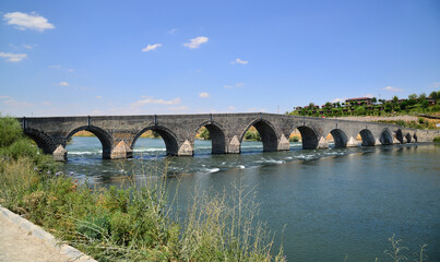 Fototapeta premium The Historical Murat Bridge, located in Mus, Turkey, was built during the Seljuk period in the 13th century.