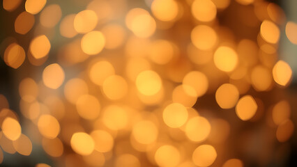 Obraz premium A light bokeh effect with subtle sparkle in champagne tones, perfect for a festive mood
