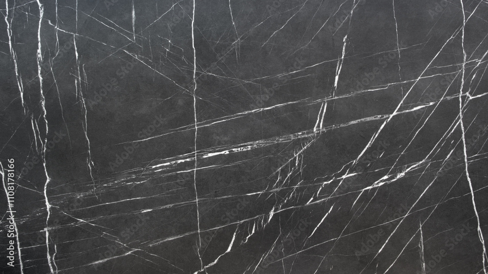 Poster a black and white photo of a marble floor with a lot of cracks. the cracks are very visible and the 