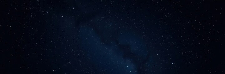 Obraz premium A mesmerizing starry night sky filled with a multitude of shining stars, galaxies, celestial