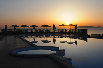 Swimming pool at sunrise