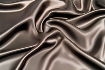 Obraz premium Elegant dark satin fabric with luxurious glossy texture, perfect for design backgrounds, fashion mockups, or sophisticated event themes