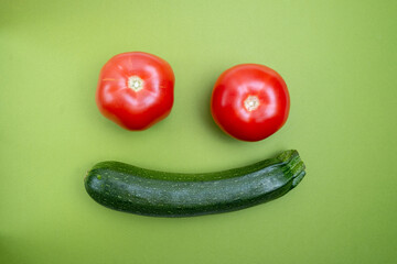 Tomatoes, zucchini, cucumbers on a light background. The concept of proper nutrition and health. Ecological food products