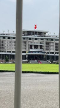 Frontal perspective of Independence Palace or Reunification Palace Dinh Doc Lap is designed main public landmark in the afternoon by architect. Ngo Viet Thu