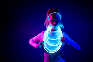 Photo of lady from futurism touch led glowing light cable look isolated ultraviolet neon color...