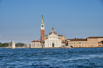 Venice: landscape with the image of boats on a channel in Venice, Italy