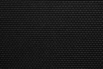 Detailed close-up of a black woven grid pattern, bold and structured texture of guitar amp fabric.